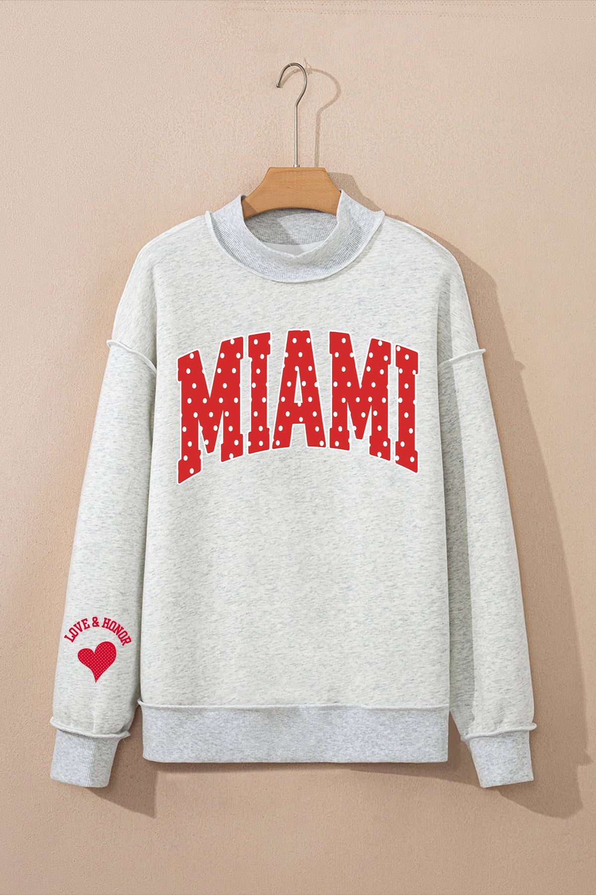 MIAMI custom polka dot applique mock neck