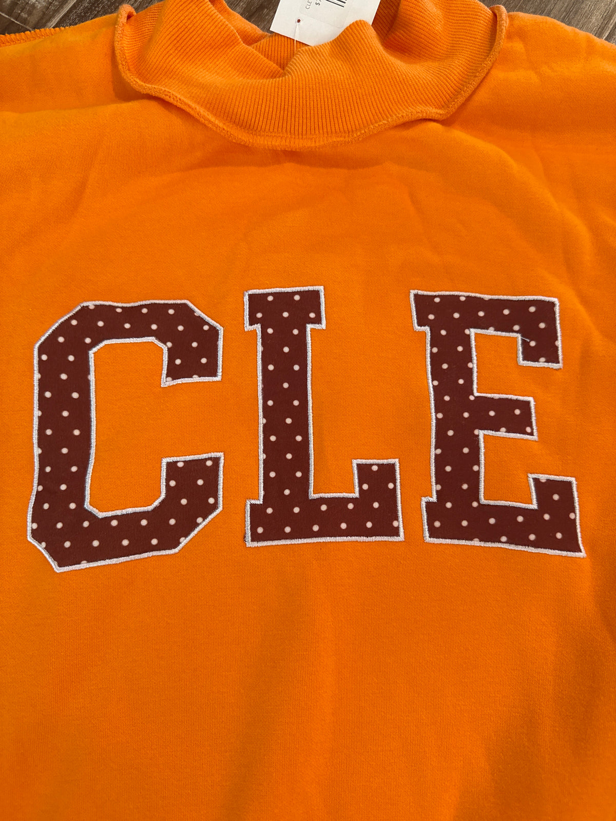 CLE stand out orange mock neck