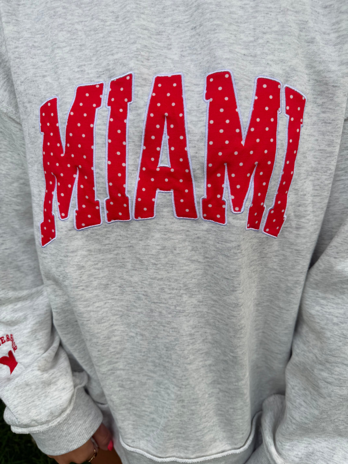 MIAMI custom polka dot applique mock neck