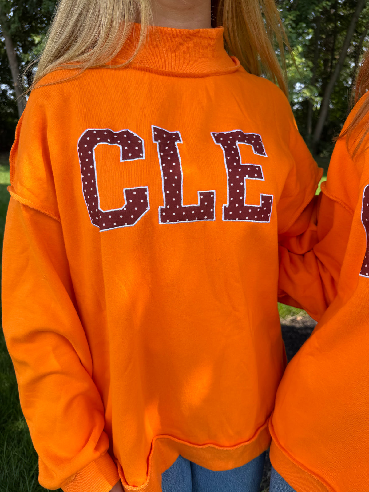 CLE stand out orange mock neck