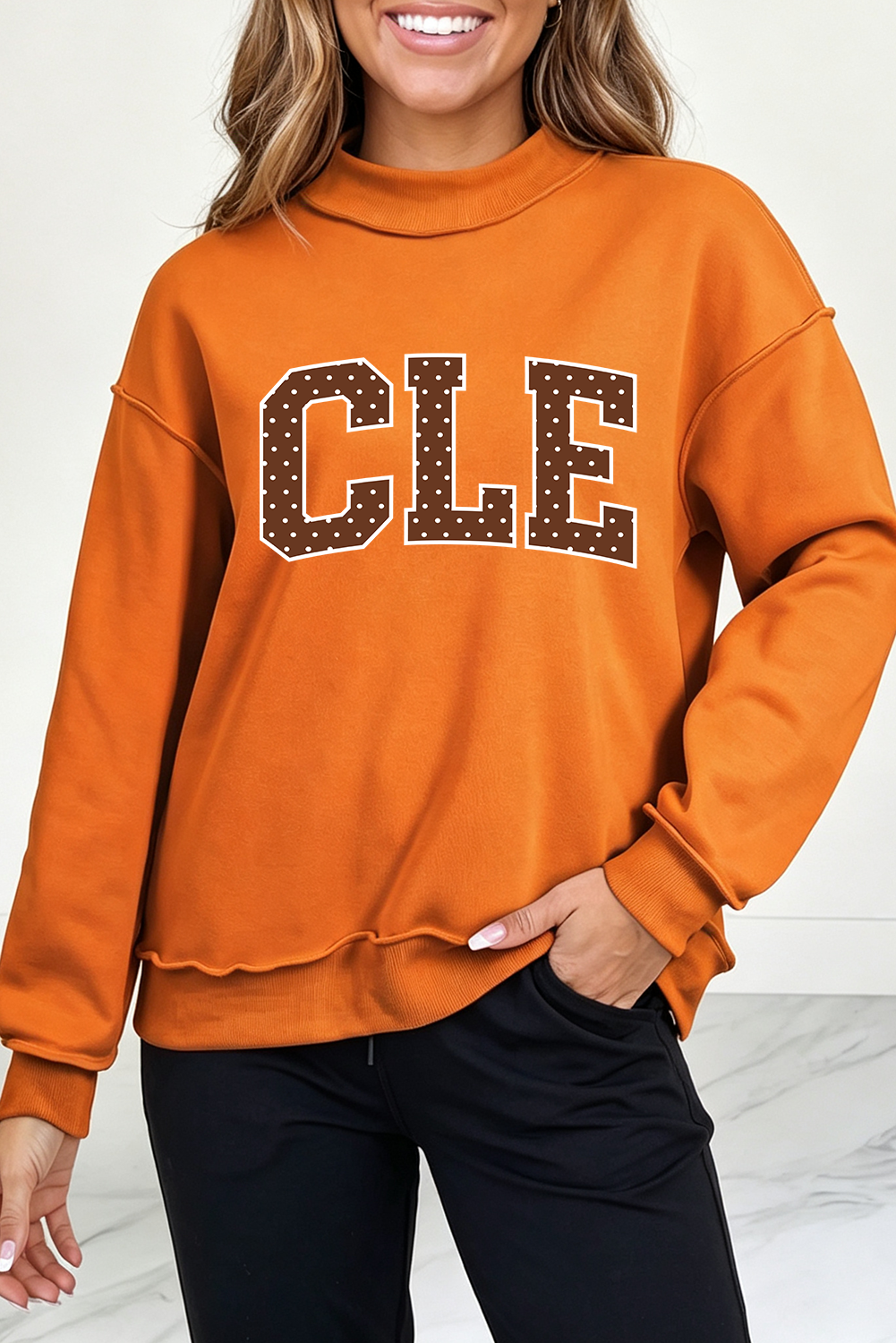 CLE stand out orange mock neck