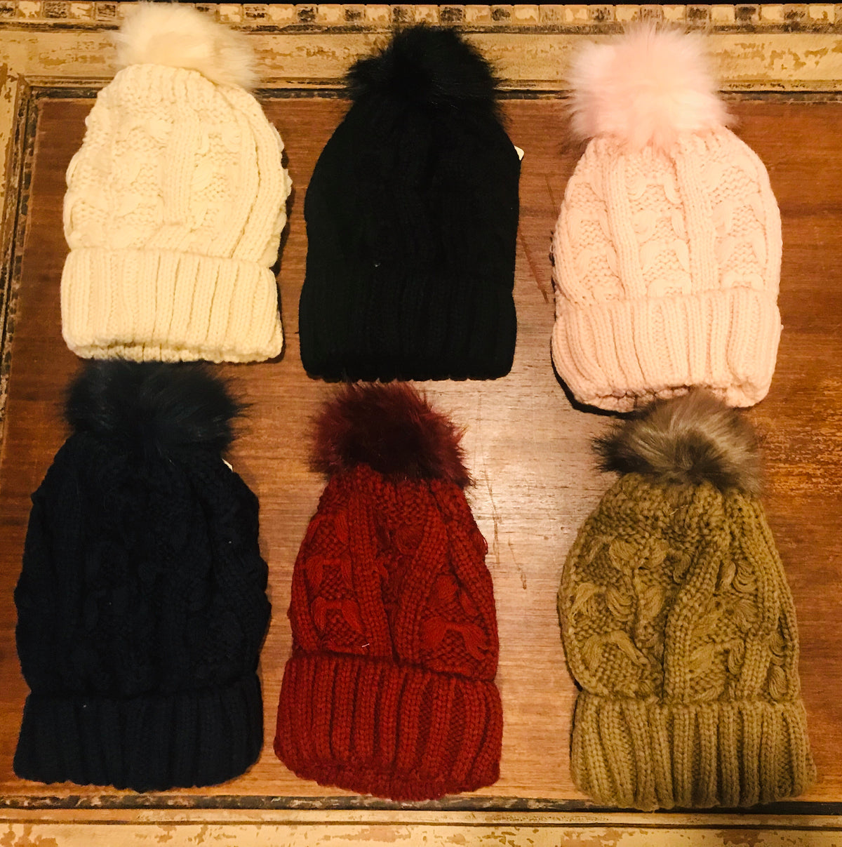 Fleece lined hat with matching pom